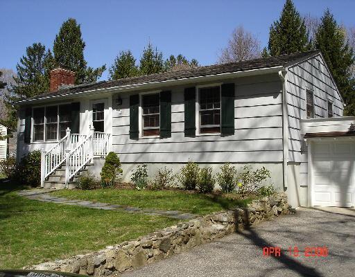 17 Hayes Lane Ridgefield, CT 06877 - Photo 1 of 1 front view of a house with a yard
