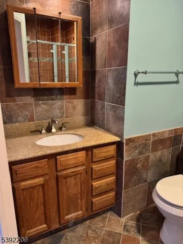 a bathroom with a sink and a toilet