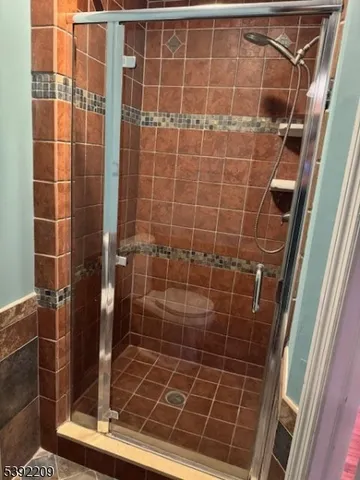 a bathroom with a glass shower