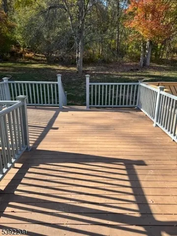 a balcony with wooden floor