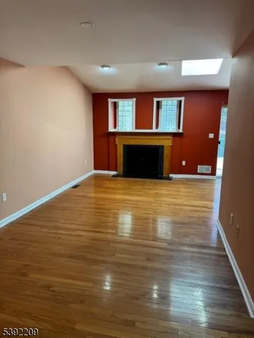 a view of kitchen with wooden floor