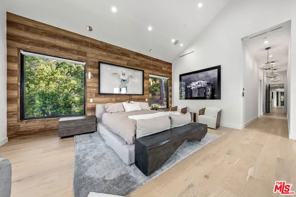 a bathroom with a sink toilet and a mirror