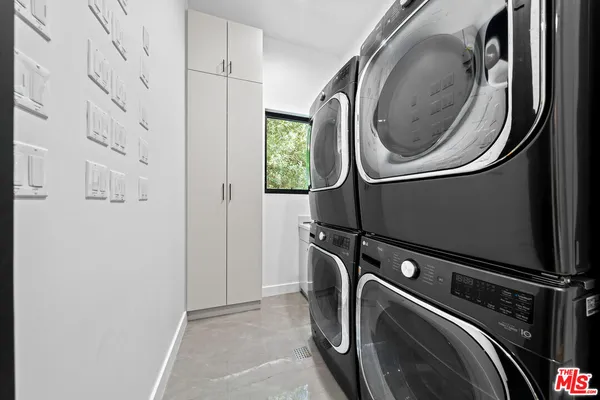 a view of a backyard with swimming pool