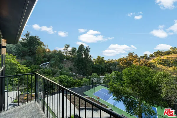 a view of house with a yard