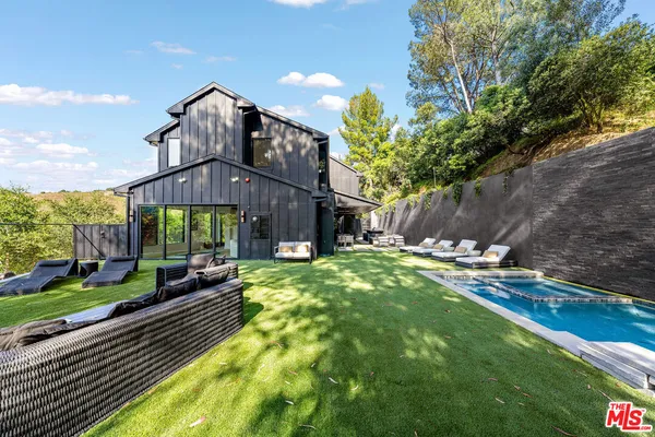 a view of a house with a street