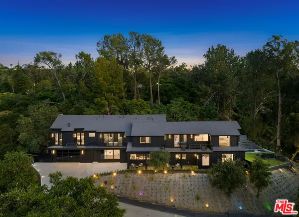a view of a house with roof deck