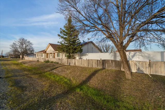 an aerial view of residential building and ocean