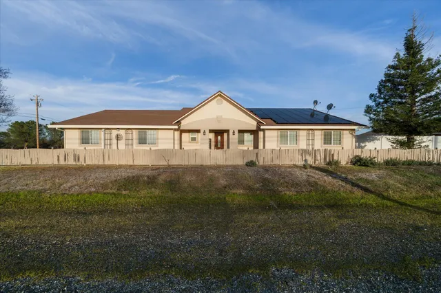 front view of a house with a street view