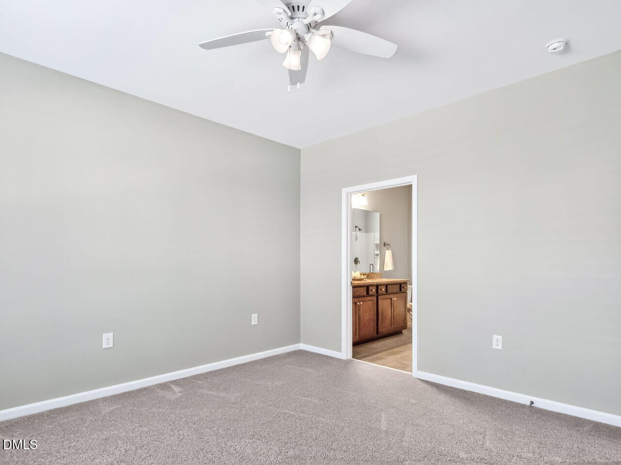 123 Merganser Way Durham, NC 27703 - Photo 18 of 37 an empty room with chandelier fan and windows