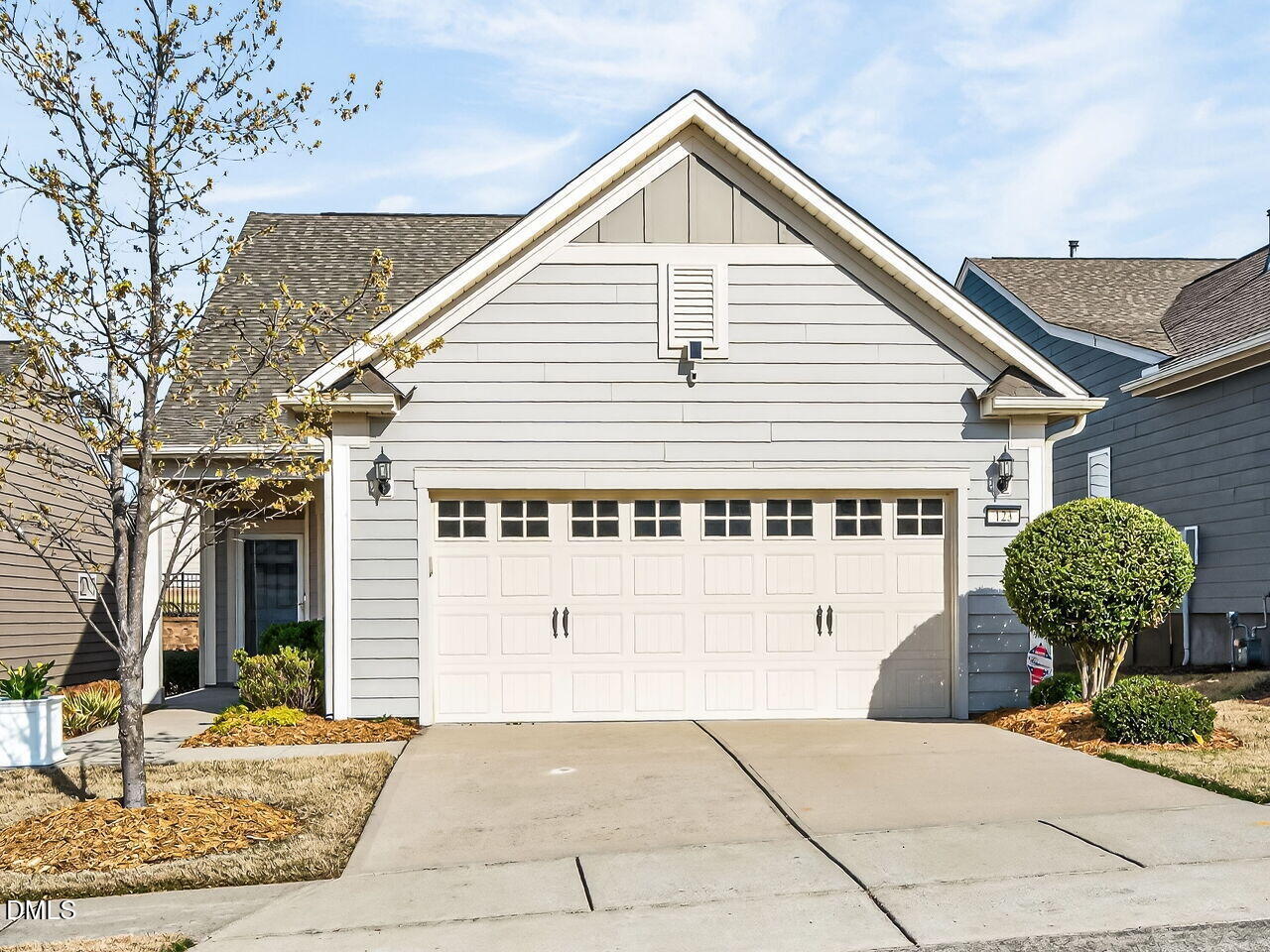 123 Merganser Way Durham, NC 27703 - Photo 2 of 37 a front view of a house with garden
