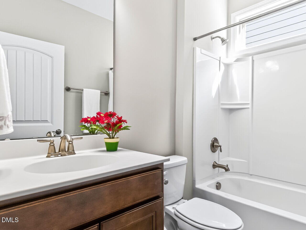 123 Merganser Way Durham, NC 27703 - Photo 23 of 37 a bathroom with a sink toilet and shower