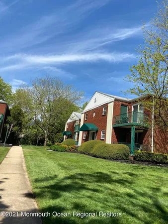 a view of a house with a big yard