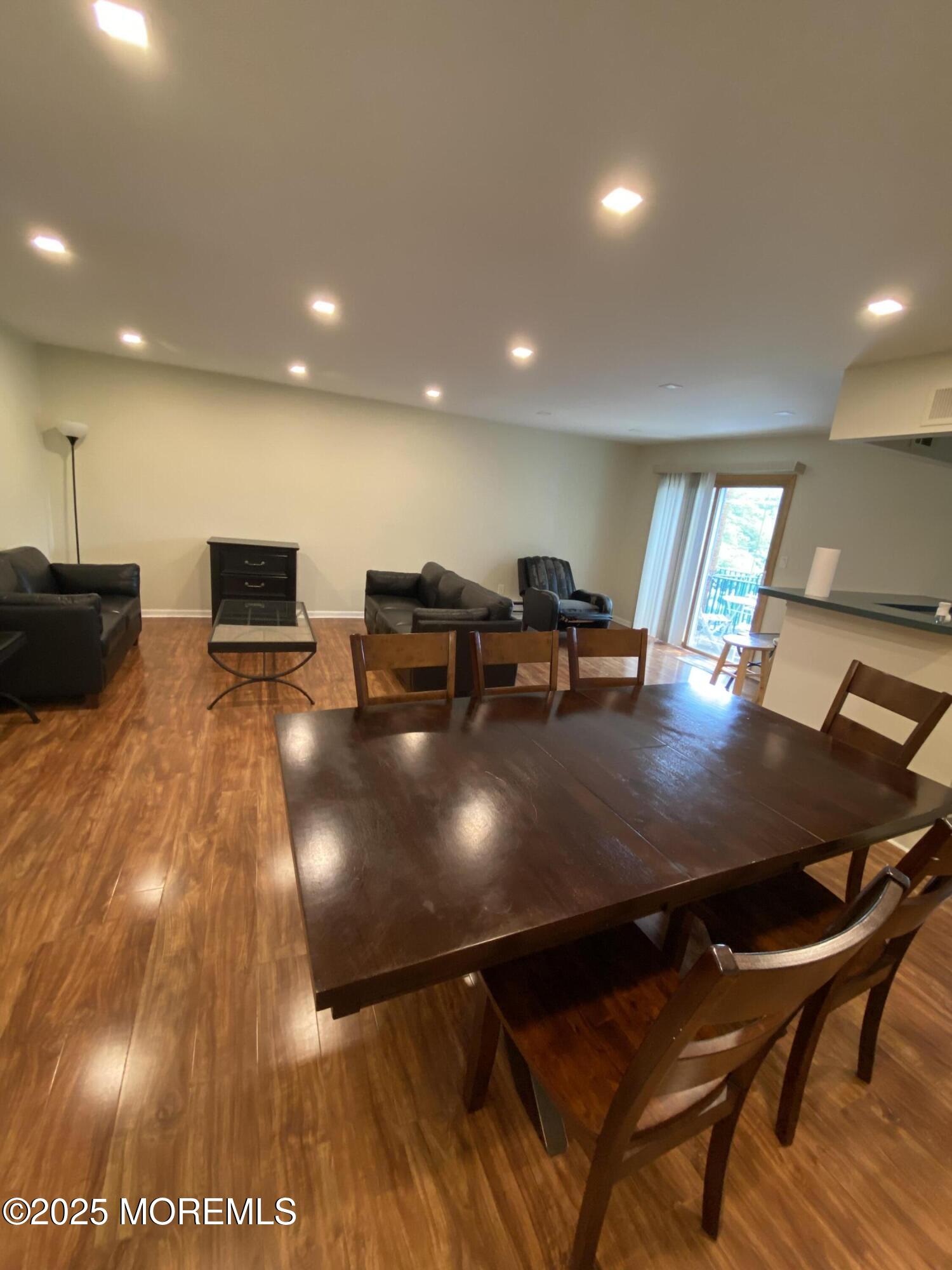 65 Cedar Avenue, Unit C4 Long Branch, NJ 07740 - Photo 3 of 10 a view of a dining room with furniture