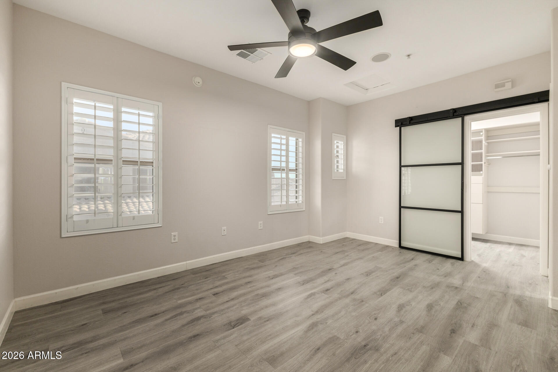 3935 East Rough Rider Road, Unit 1071 Phoenix, AZ 85050 - Photo 15 of 49 Primary Bedroom 1