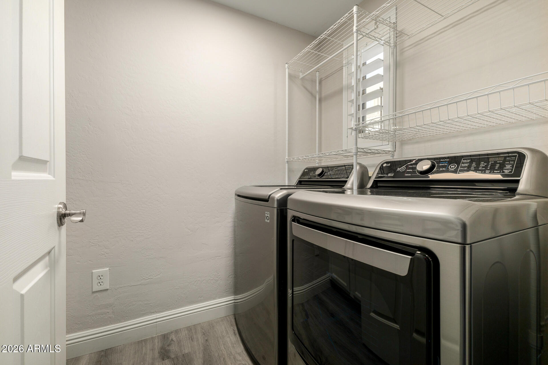 3935 East Rough Rider Road, Unit 1071 Phoenix, AZ 85050 - Photo 21 of 49 Laundry room