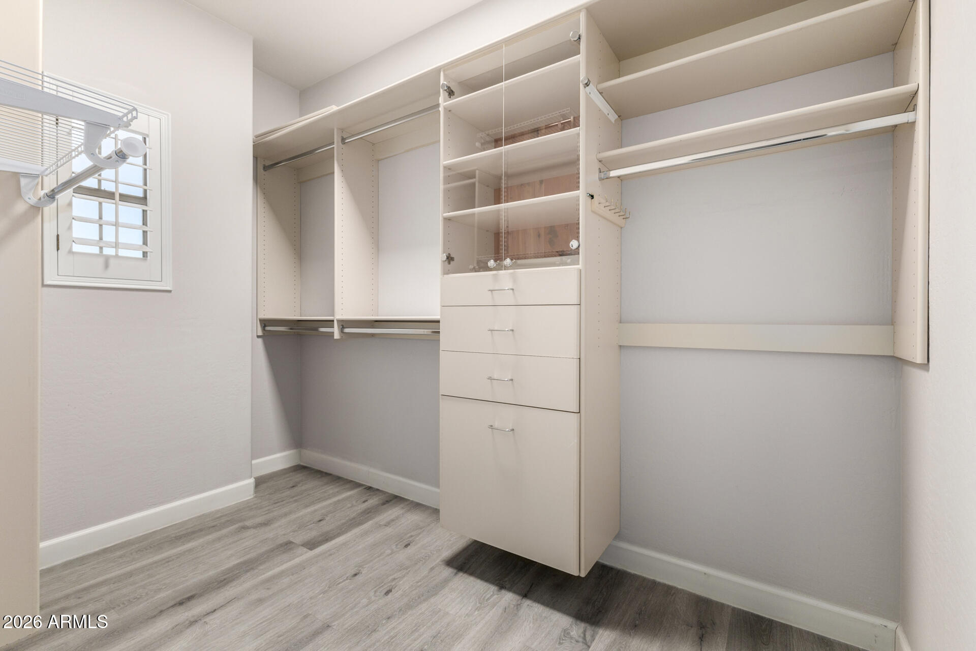 3935 East Rough Rider Road, Unit 1071 Phoenix, AZ 85050 - Photo 26 of 49 Primary Bedroom Closet