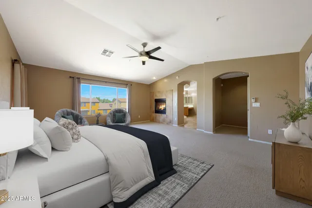a view of a livingroom with a refrigerator