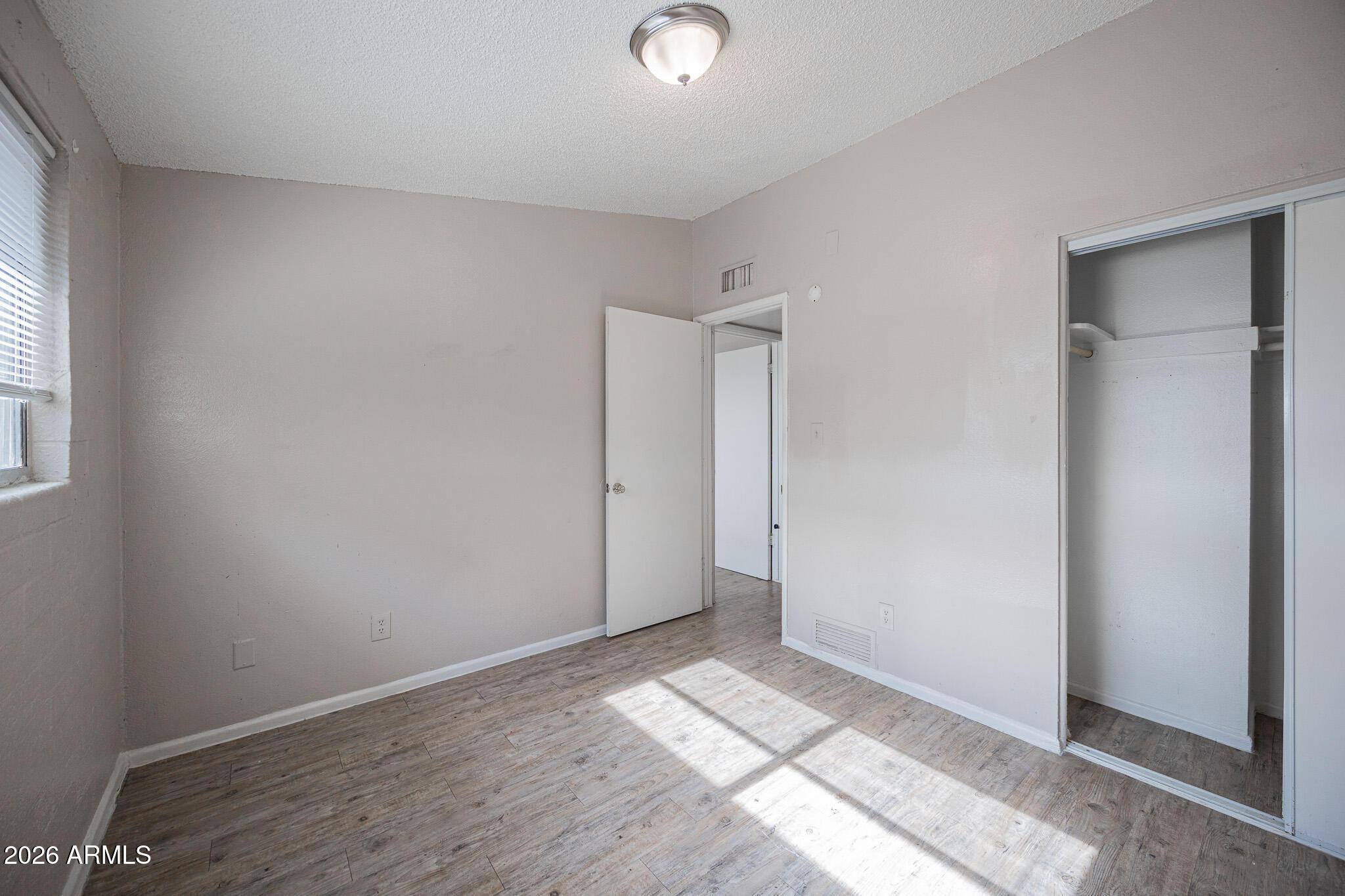 2123 West Devonshire Avenue, Unit 9 Phoenix, AZ 85015 - Photo 10 of 12 a view of an empty room
