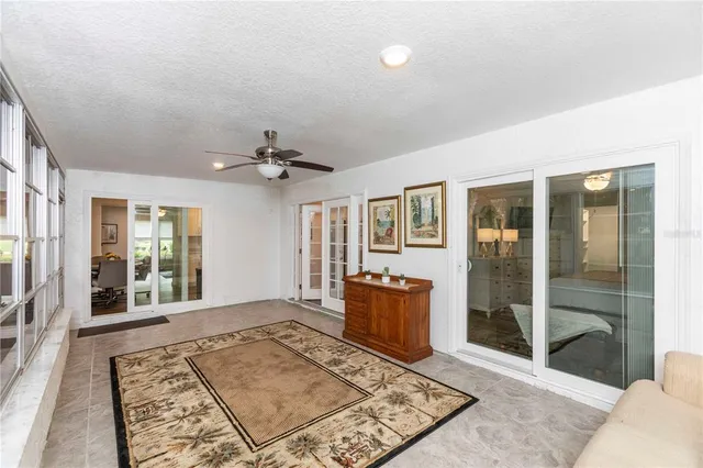 a kitchen with a sink a stove and cabinets