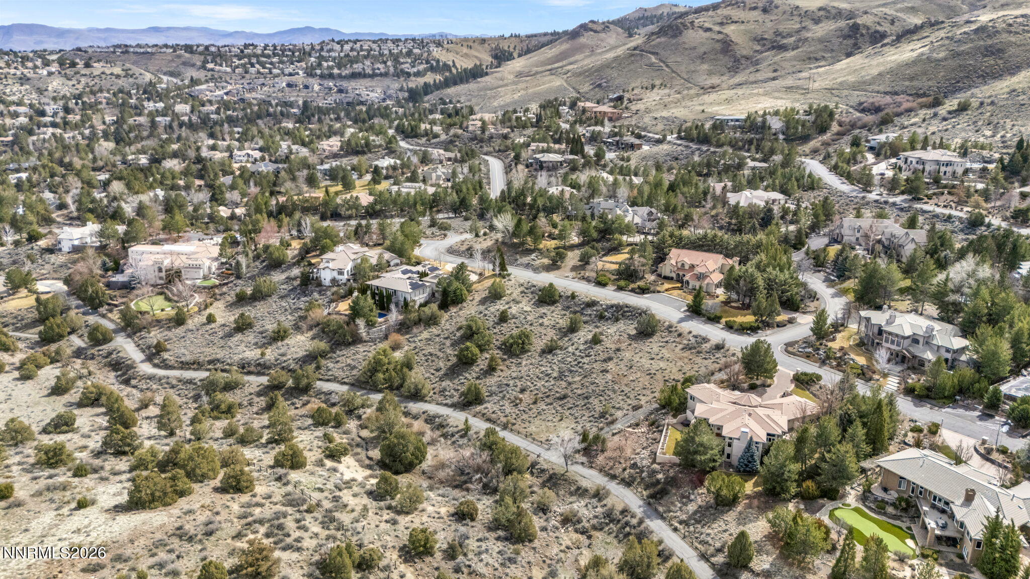 4387 Sharps Road Reno, NV 89519 - Photo 6 of 12 an aerial view of house with yard and mountain view in back