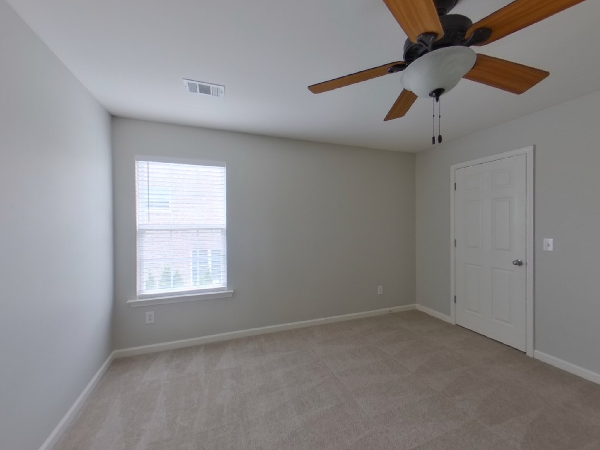 5001 Burtonwood Way Spring Hill, TN 37174 - Photo 14 of 20 an empty room with a window and a fan