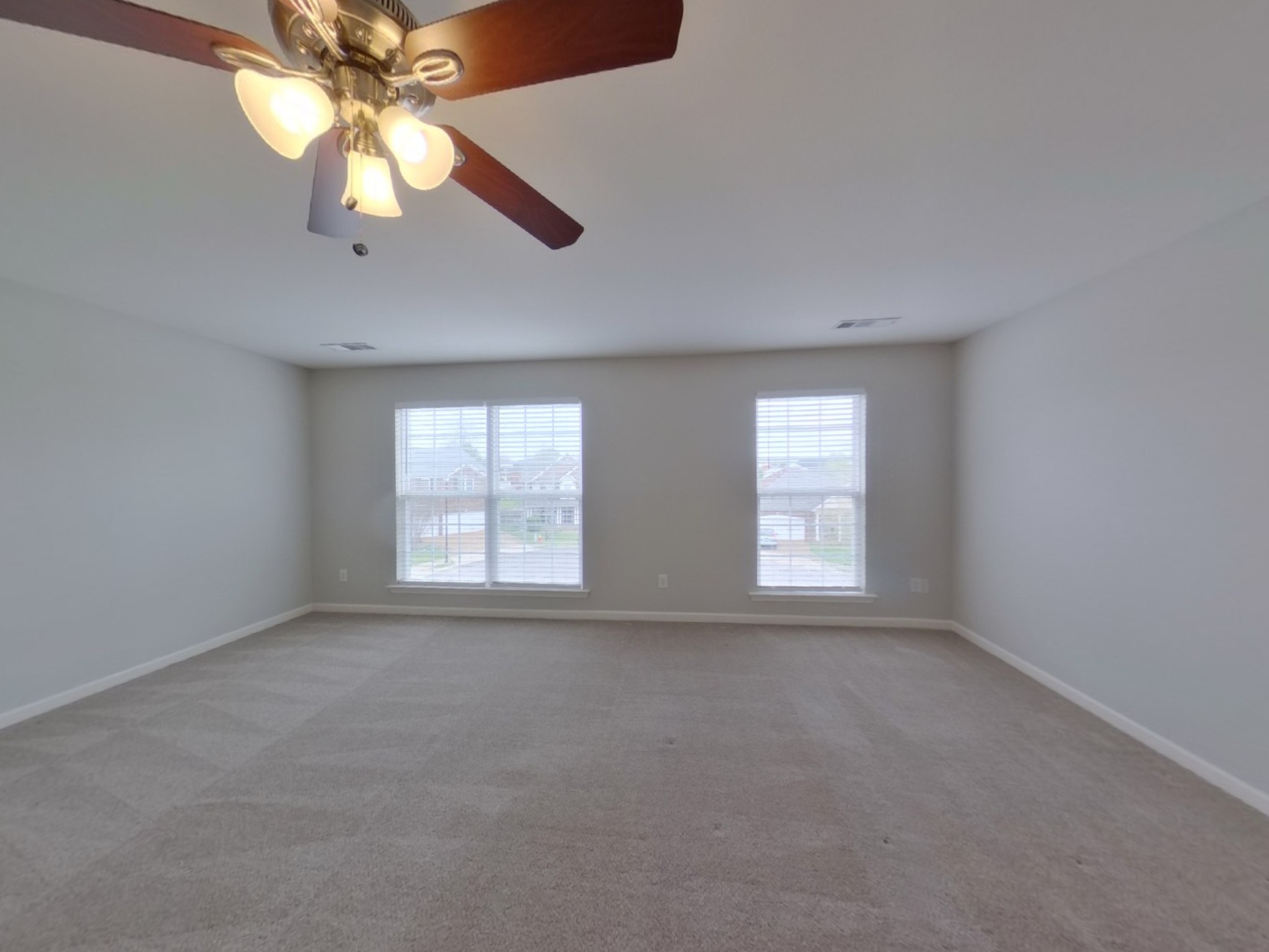 5001 Burtonwood Way Spring Hill, TN 37174 - Photo 8 of 20 an empty room with a window and a fan