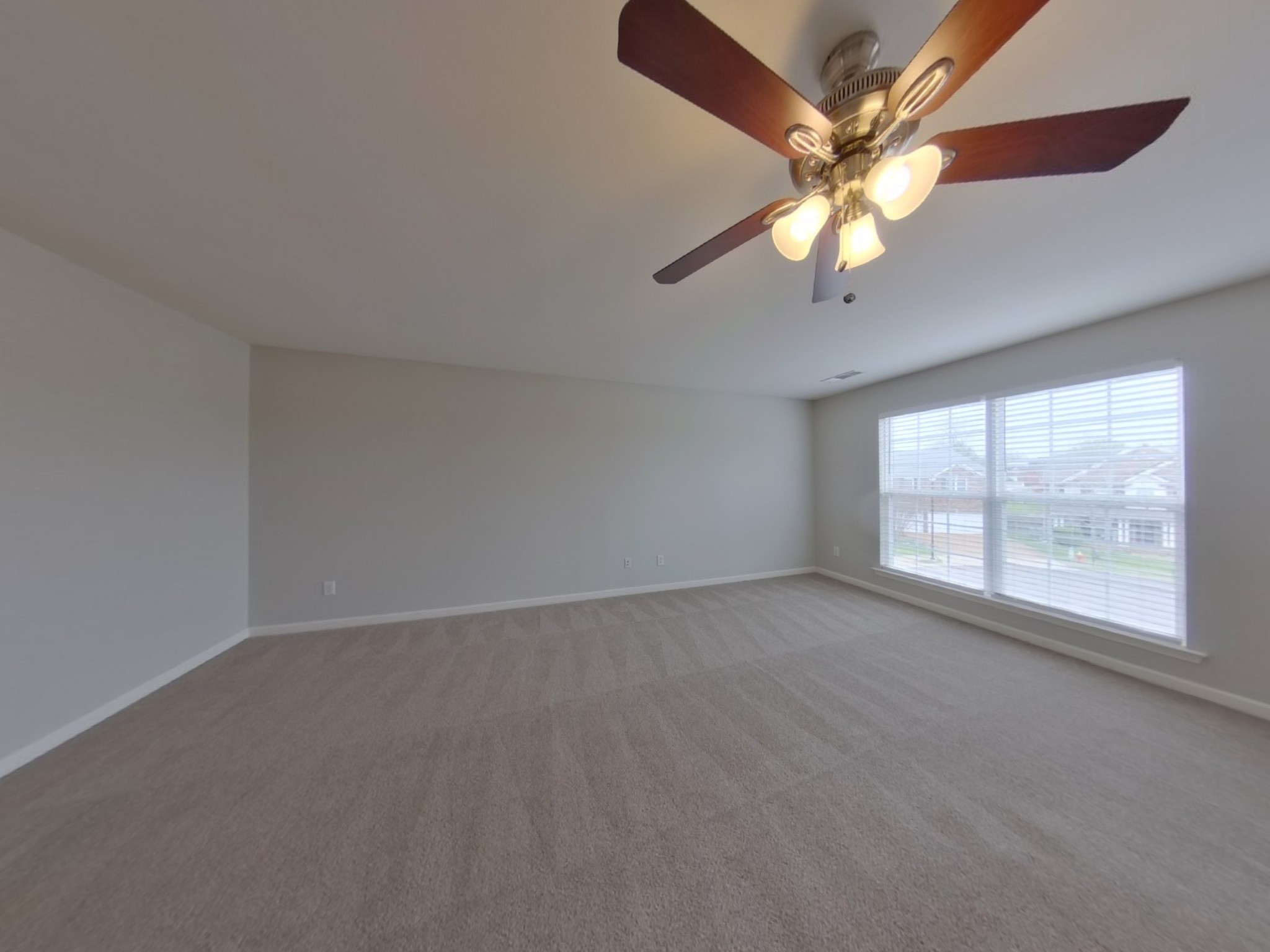 5001 Burtonwood Way Spring Hill, TN 37174 - Photo 9 of 20 an empty room with windows and fan