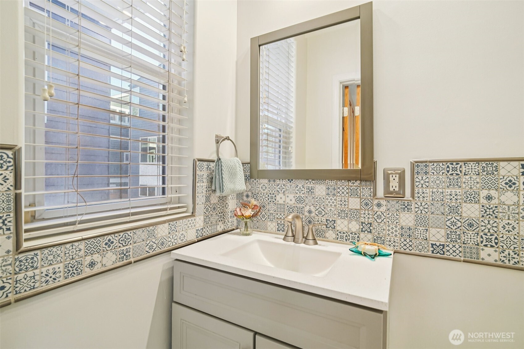 534 25th Avenue South Seattle, WA 98144 - Photo 11 of 35 a bathroom with a sink and a mirror