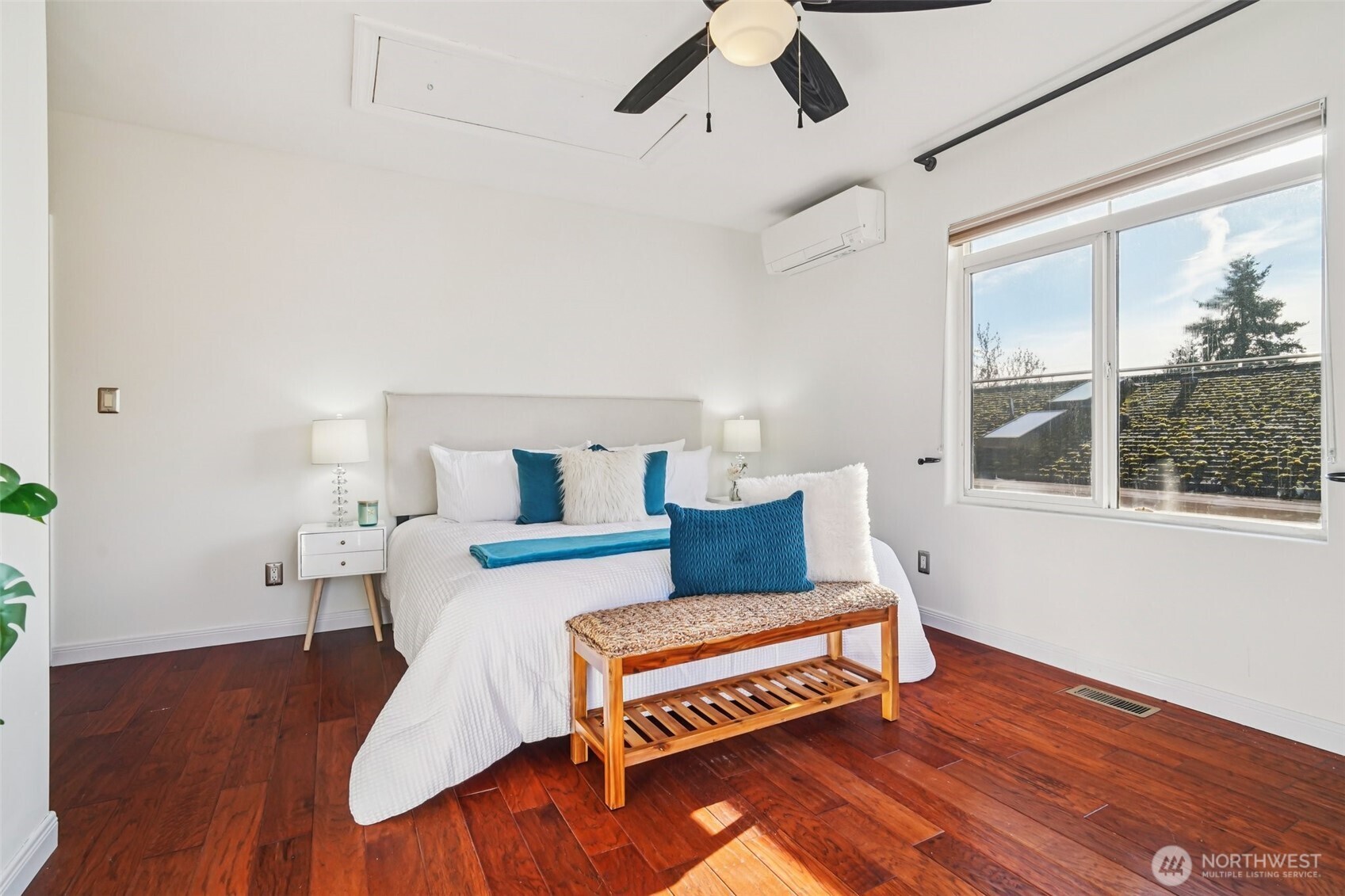 534 25th Avenue South Seattle, WA 98144 - Photo 13 of 35 a bedroom with furniture and wooden floor