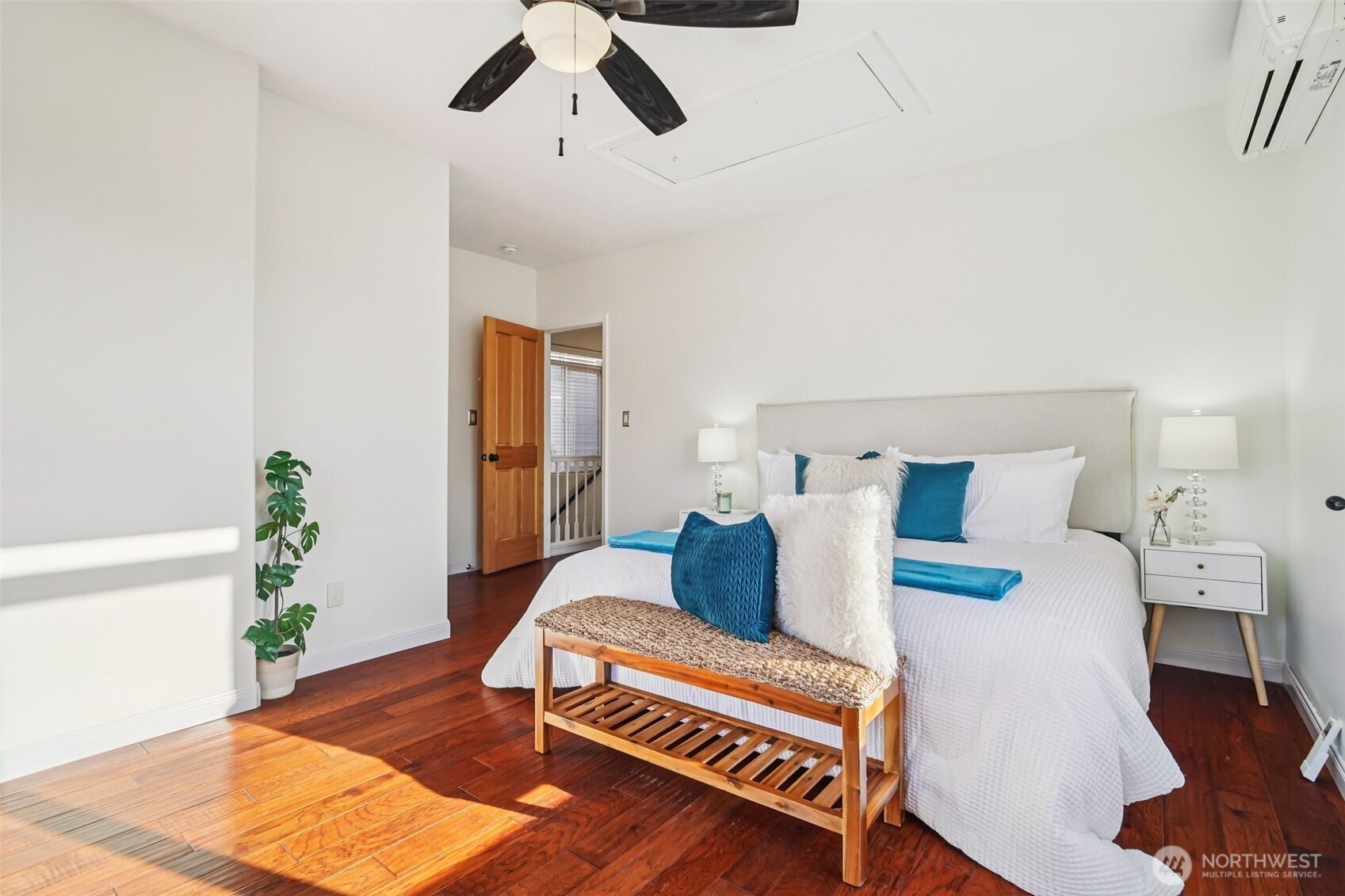 534 25th Avenue South Seattle, WA 98144 - Photo 14 of 35 a bedroom with furniture and wooden floor