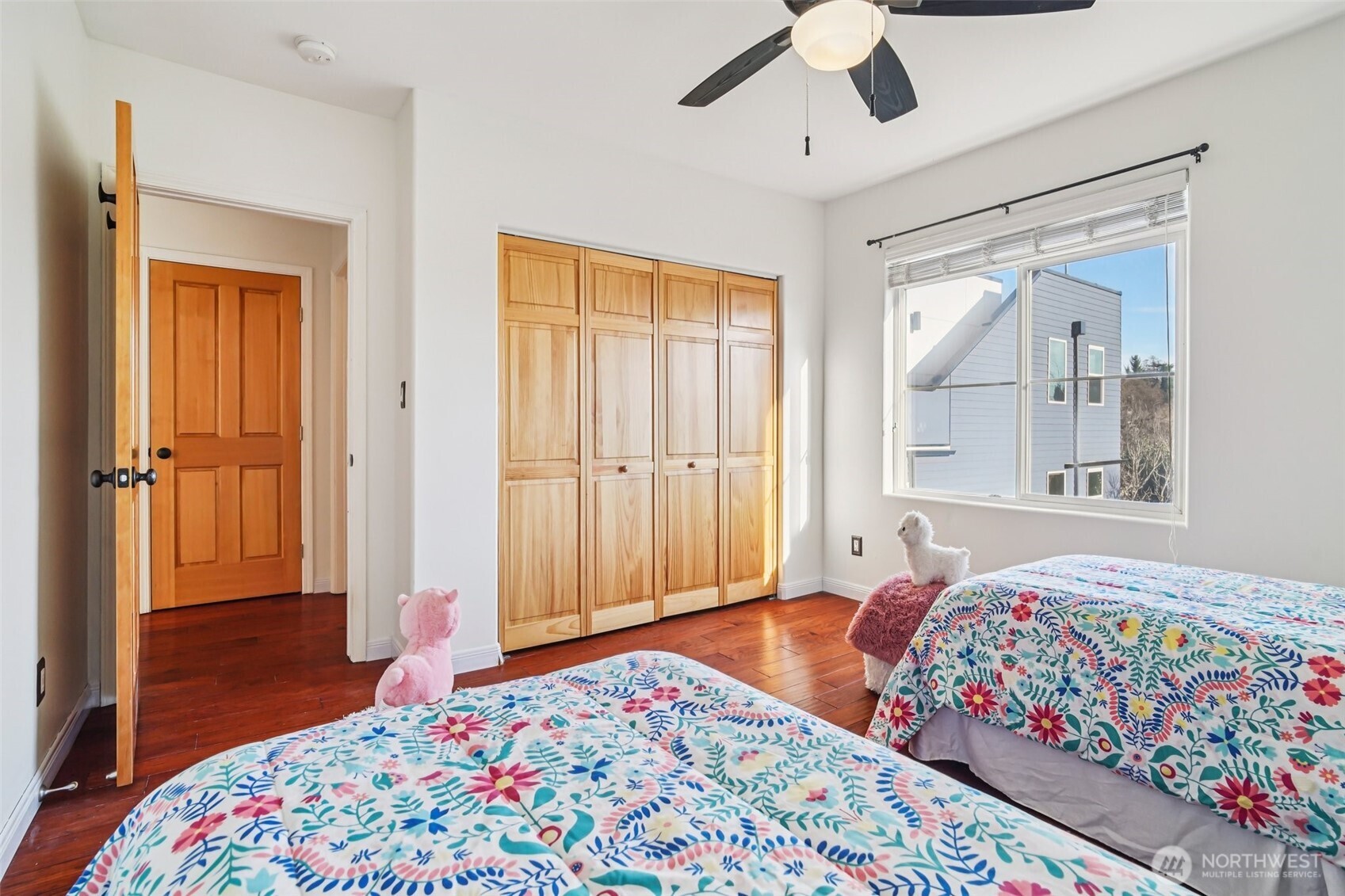 534 25th Avenue South Seattle, WA 98144 - Photo 17 of 35 a bedroom with a bed and a painting on the wall