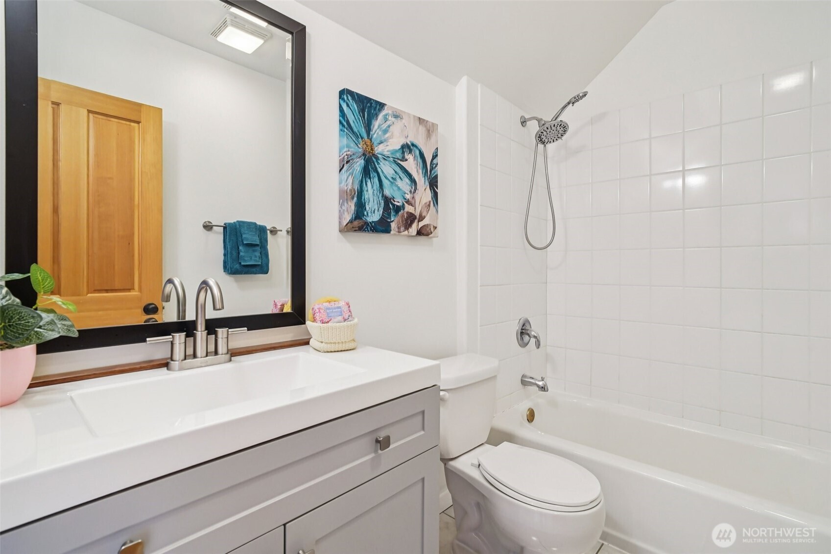 534 25th Avenue South Seattle, WA 98144 - Photo 18 of 35 a bathroom with a sink a toilet and shower