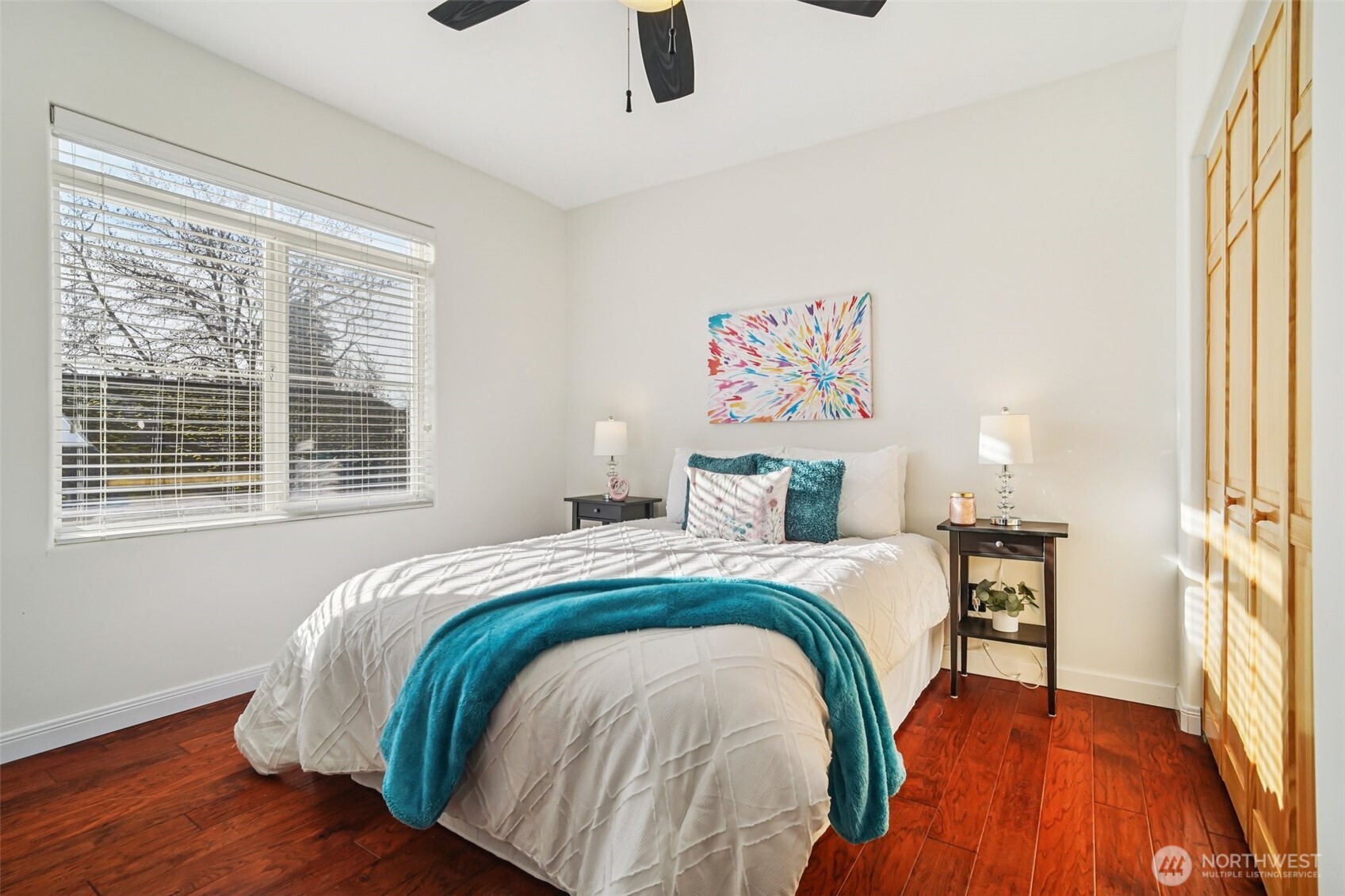 534 25th Avenue South Seattle, WA 98144 - Photo 19 of 35 a bedroom with a bed and wooden floor