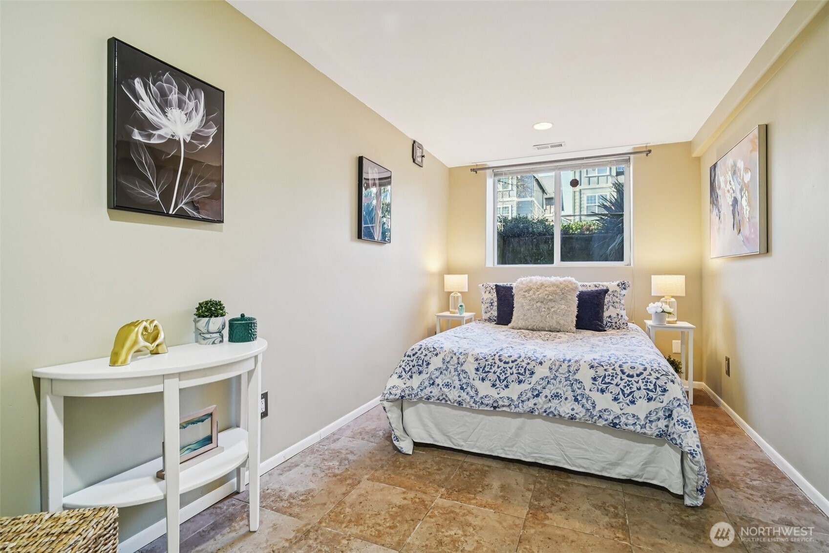 534 25th Avenue South Seattle, WA 98144 - Photo 21 of 35 a bedroom with a bed and a window