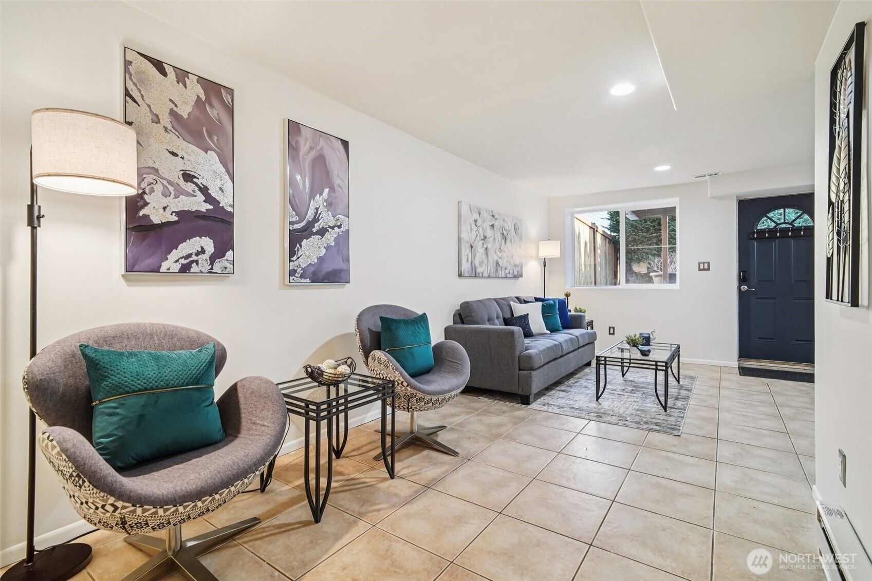 534 25th Avenue South Seattle, WA 98144 - Photo 23 of 35 a living room with furniture and a rug