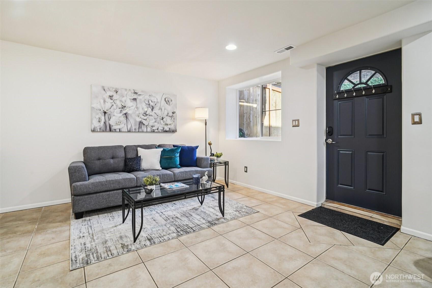 534 25th Avenue South Seattle, WA 98144 - Photo 25 of 35 a living room with furniture and wooden floor