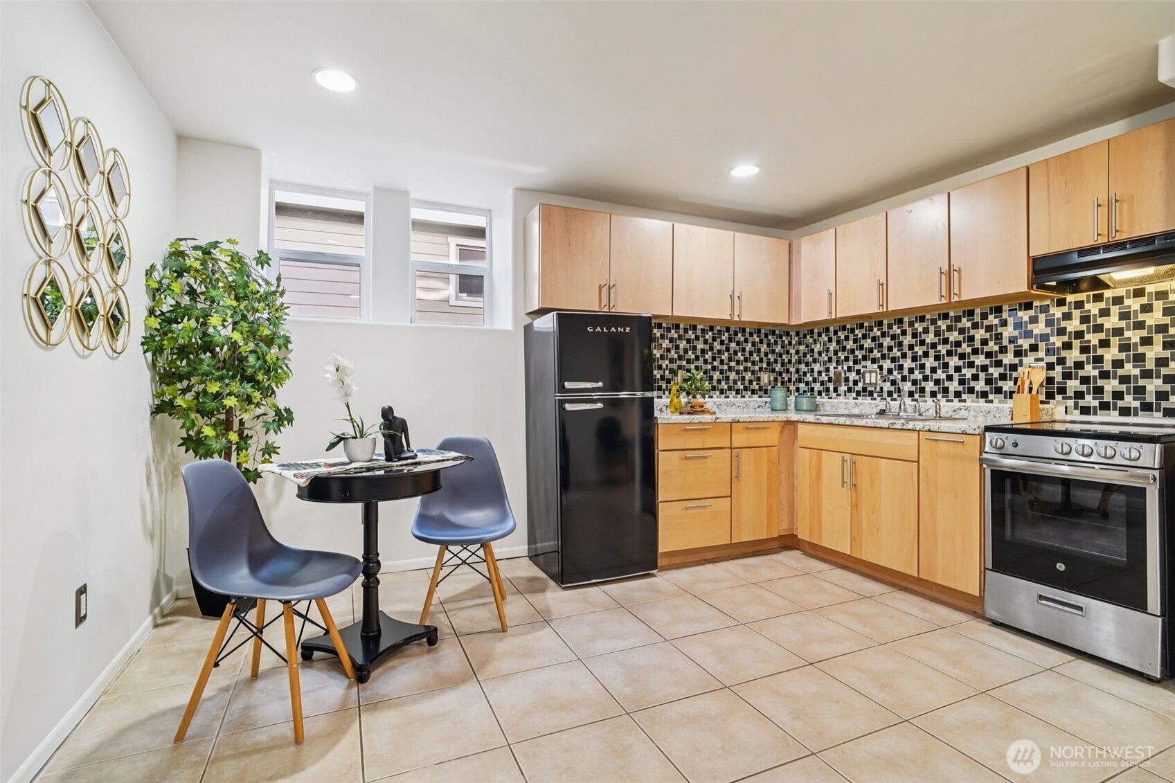534 25th Avenue South Seattle, WA 98144 - Photo 27 of 35 a kitchen with a table and chairs