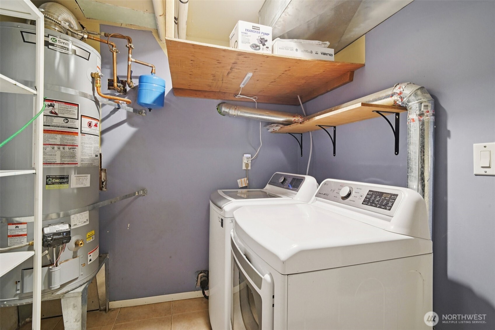 534 25th Avenue South Seattle, WA 98144 - Photo 30 of 35 a utility room with dryer and washer