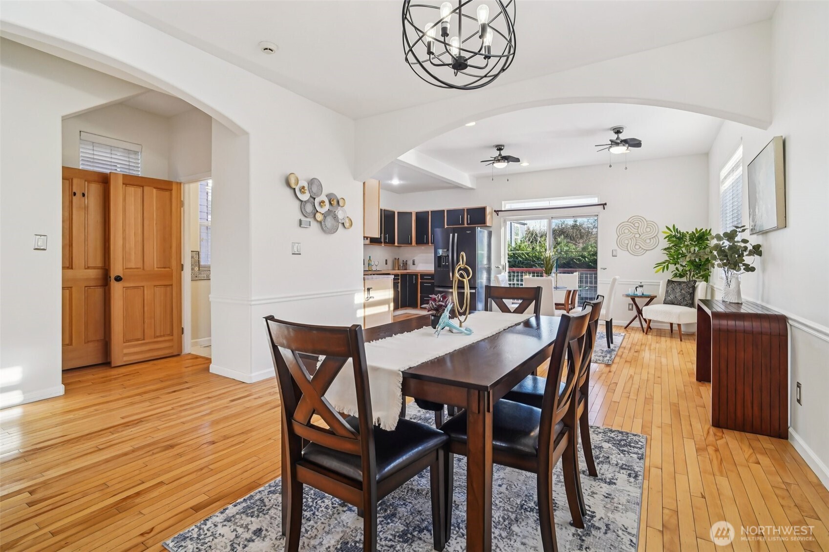 534 25th Avenue South Seattle, WA 98144 - Photo 5 of 35 a view of a dining room with furniture and wooden floor