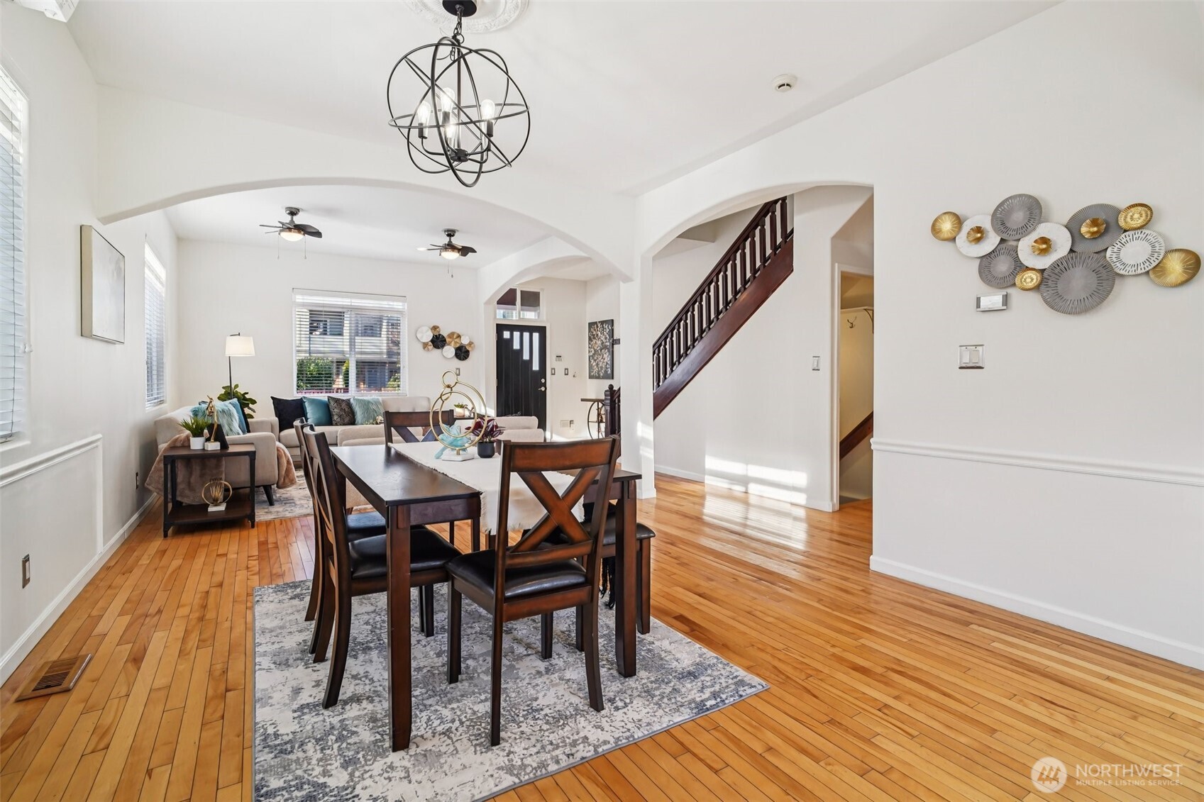 534 25th Avenue South Seattle, WA 98144 - Photo 6 of 35 a view of a dining room with furniture and wooden floor