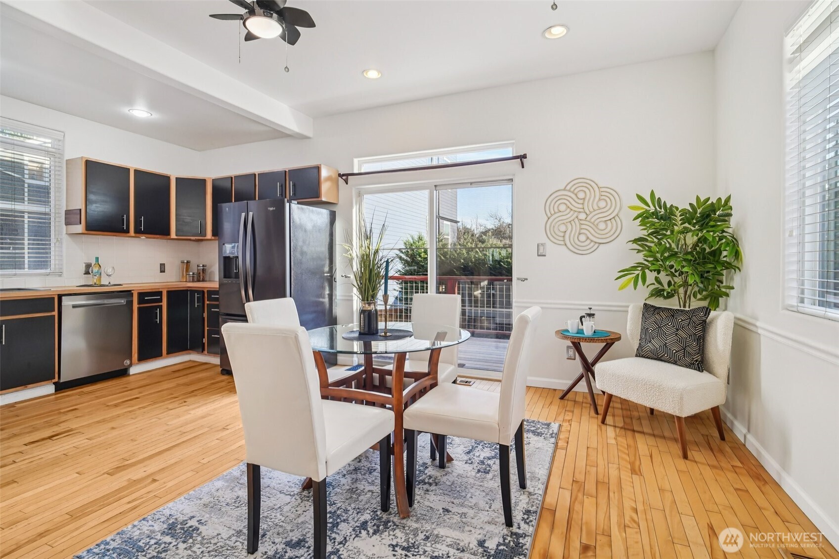 534 25th Avenue South Seattle, WA 98144 - Photo 7 of 35 a view of a dining room with furniture window and wooden floor
