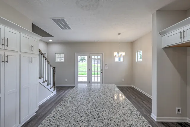 a large kitchen with cabinets