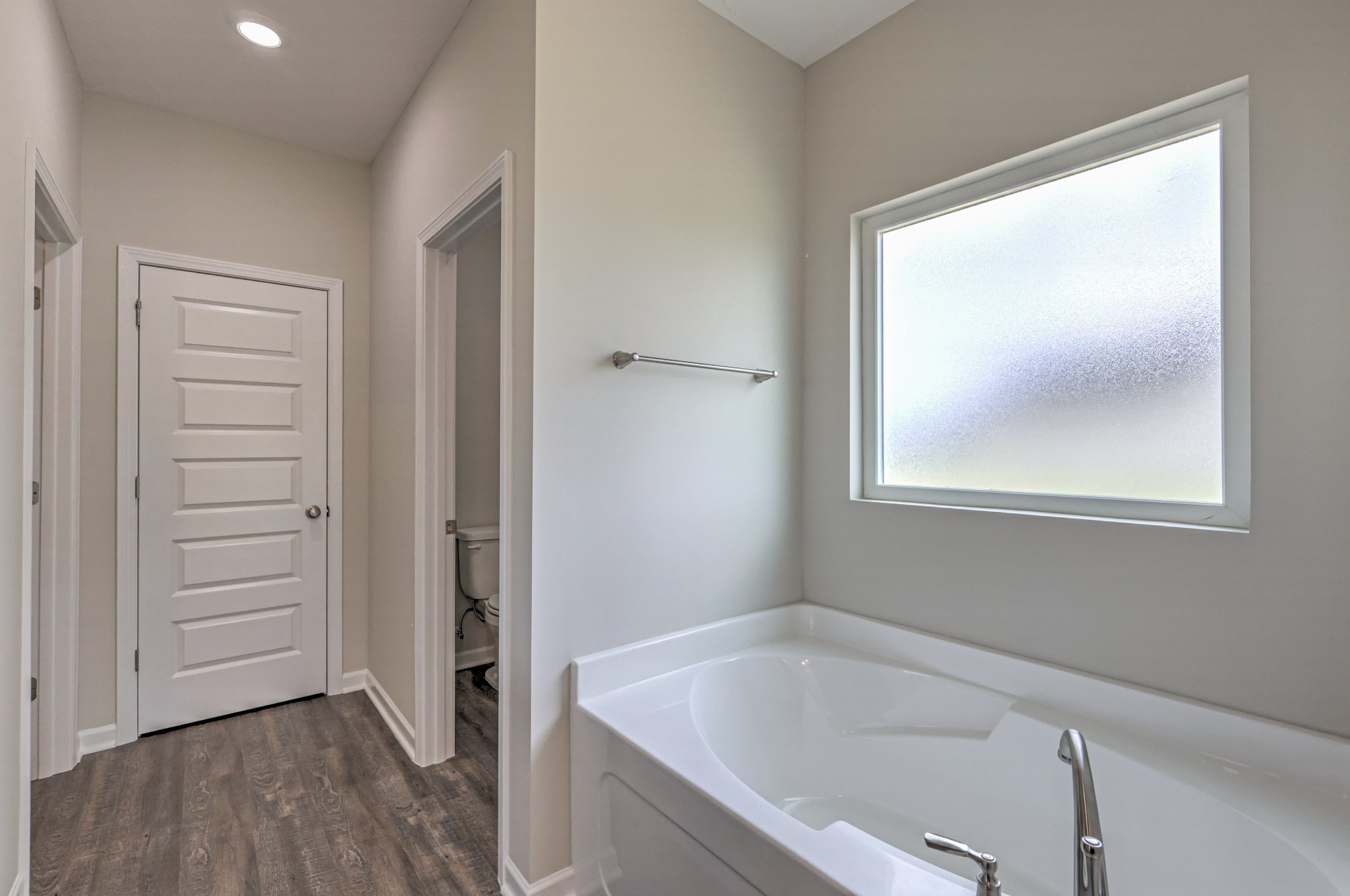 22 Bartow Street Decherd, TN 37324 - Photo 20 of 38 a bathroom with a tub and shower