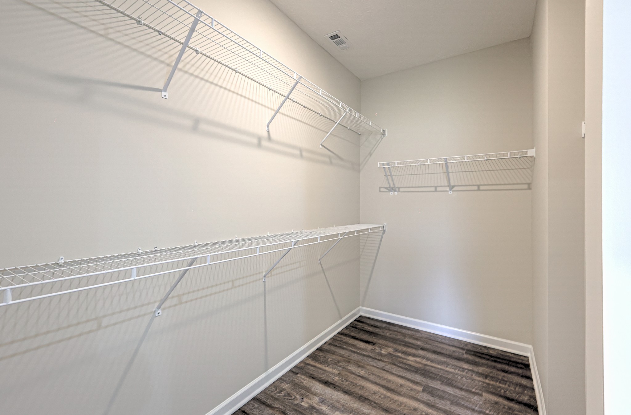 22 Bartow Street Decherd, TN 37324 - Photo 21 of 38 a view of a room with racks on the wall