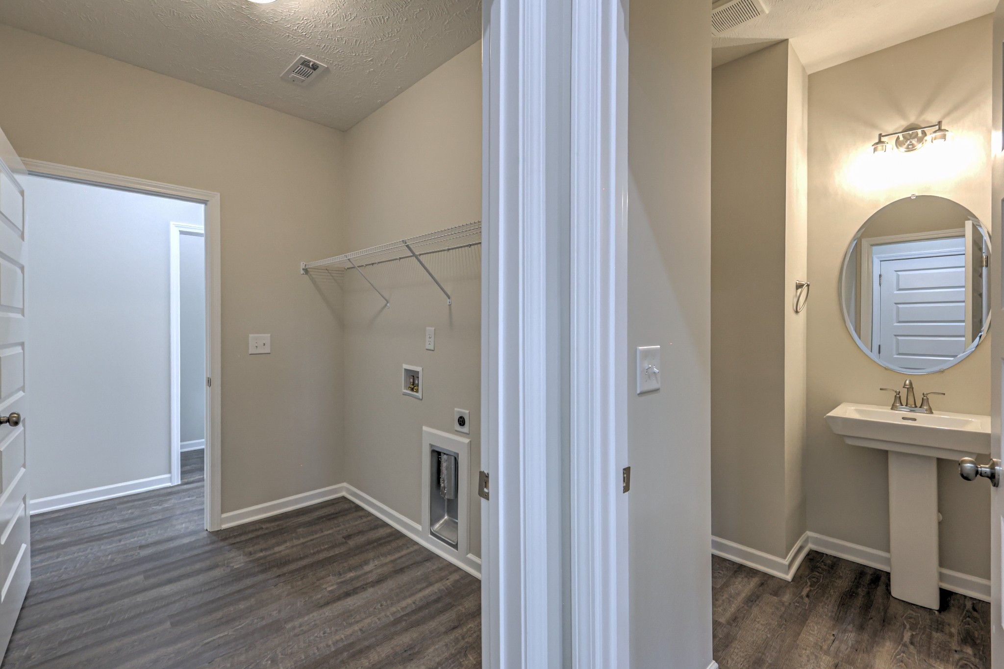 22 Bartow Street Decherd, TN 37324 - Photo 25 of 38 a view of a hallway with wooden floor and closet