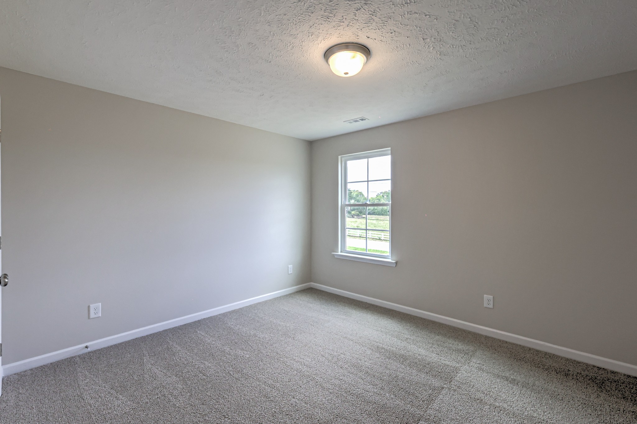 22 Bartow Street Decherd, TN 37324 - Photo 27 of 38 an empty room with a window