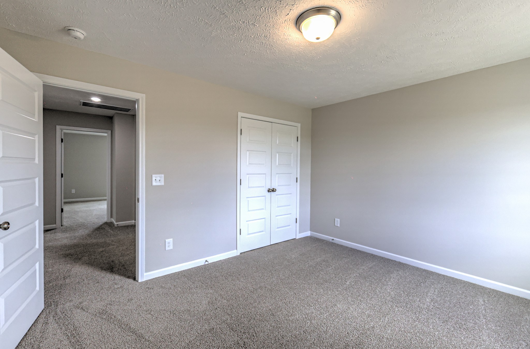 22 Bartow Street Decherd, TN 37324 - Photo 28 of 38 an empty room with closet and windows