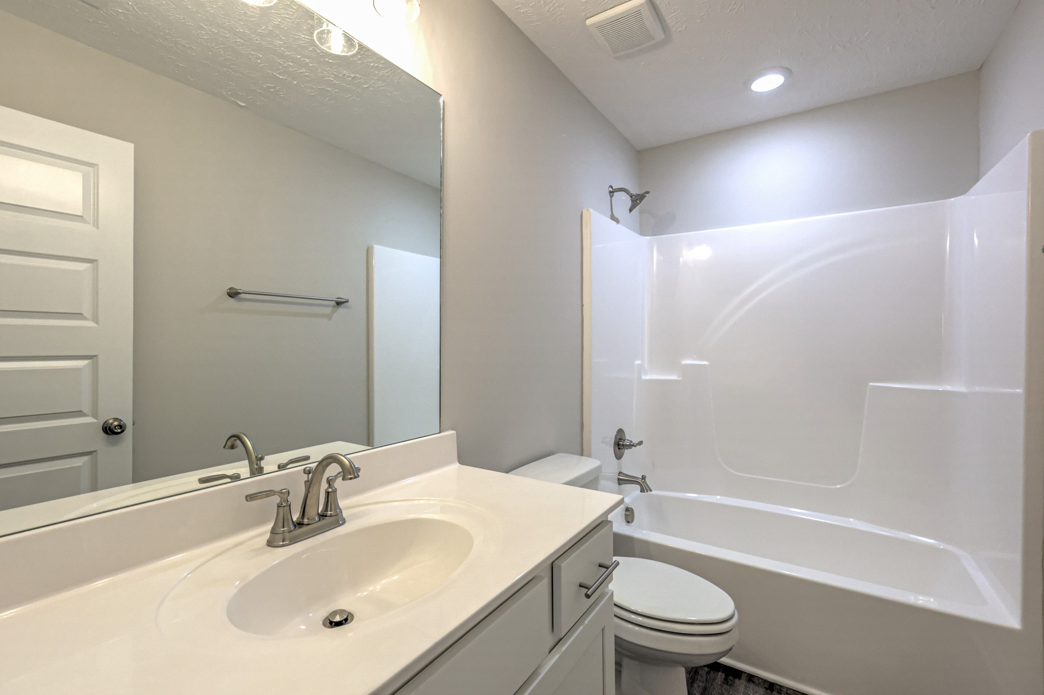 22 Bartow Street Decherd, TN 37324 - Photo 29 of 38 a bathroom with a sink a toilet and shower