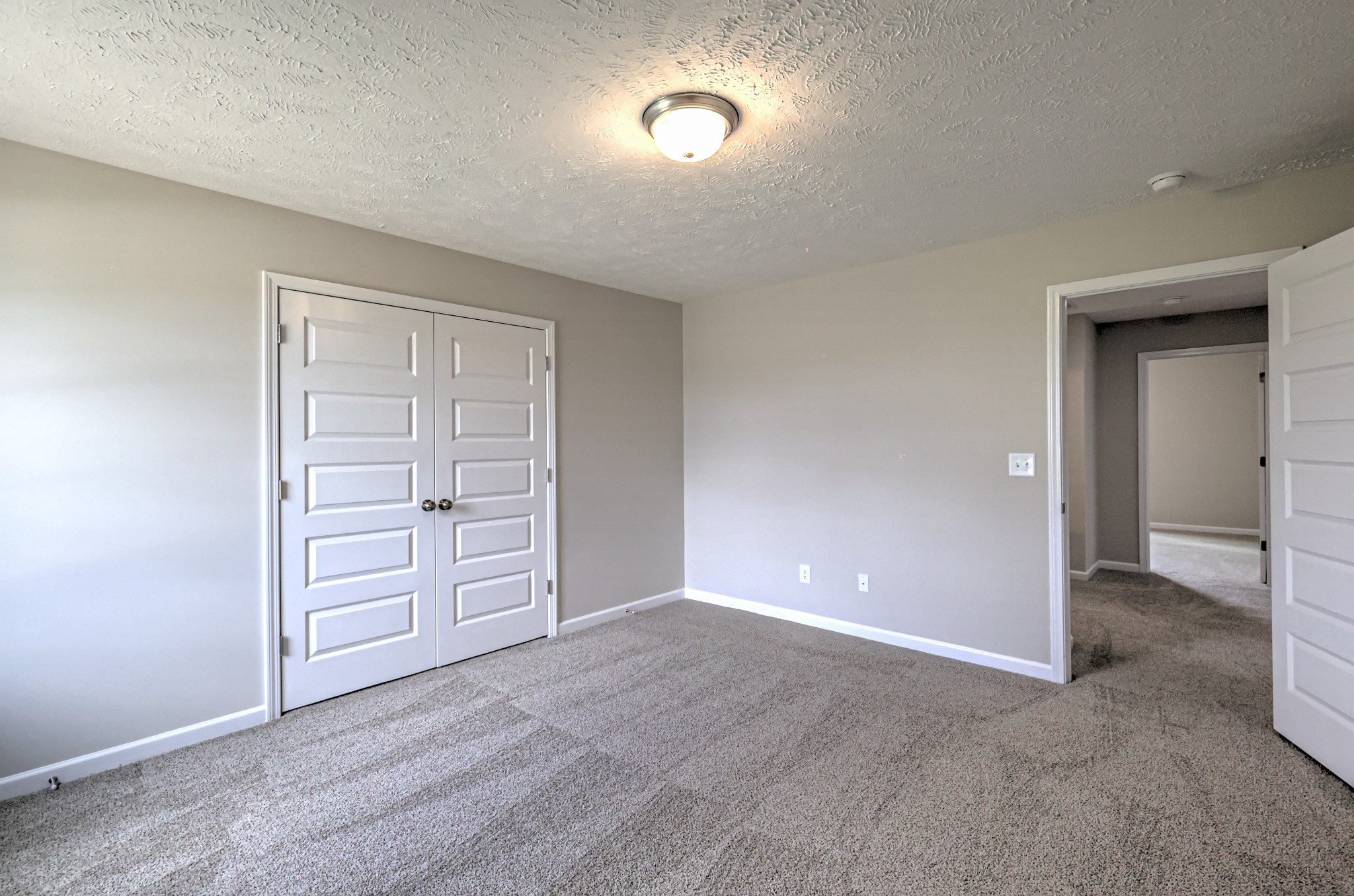 22 Bartow Street Decherd, TN 37324 - Photo 31 of 38 wooden floor and closet in a room