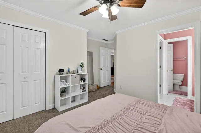 a bathroom with a sink mirror and a shower
